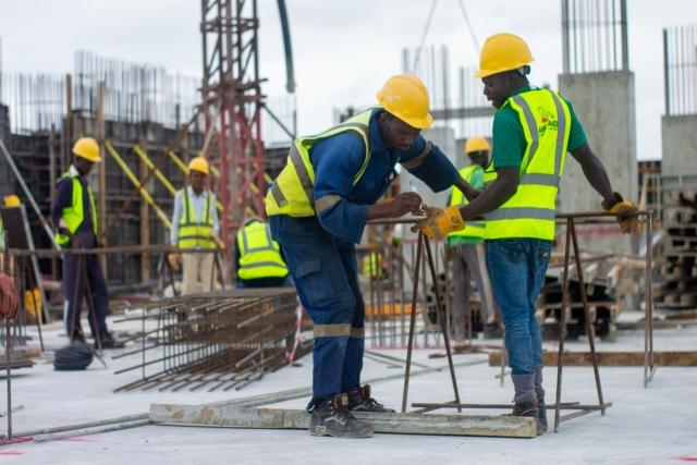 Men in hi-vis clothing on a construction site