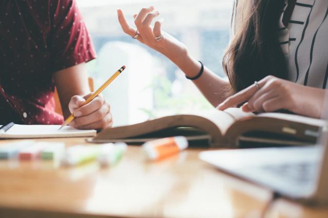 Two young people studying